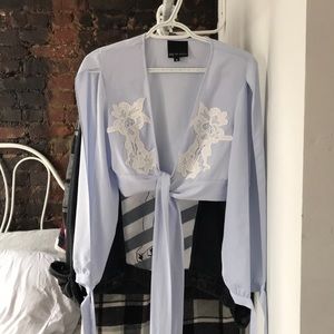 Wrap around top with open sleeves!